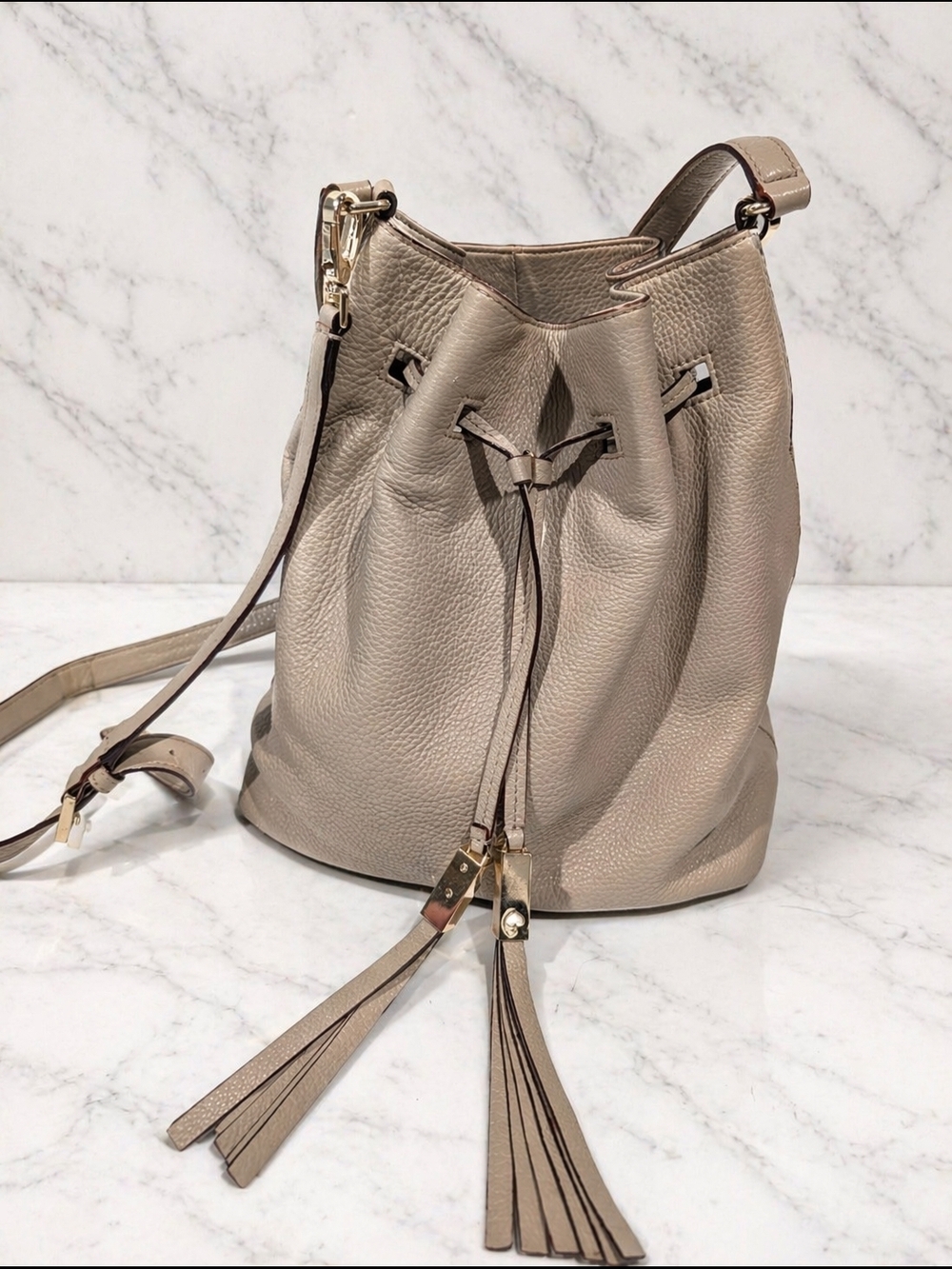 kate spade Beige Leather Drawstring Bucket Bag with Tassels
